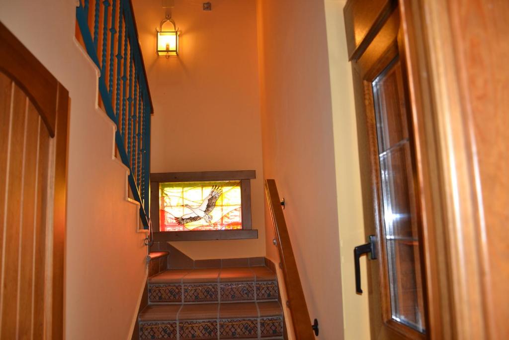 Una televisión o centro de entretenimiento en Apartamentos Rurales Natura