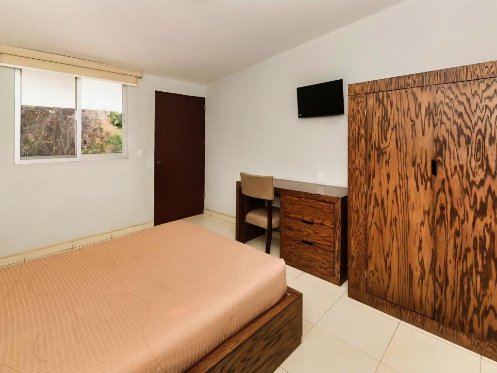 TV a/nebo společenská místnost v ubytování Hotel JM
