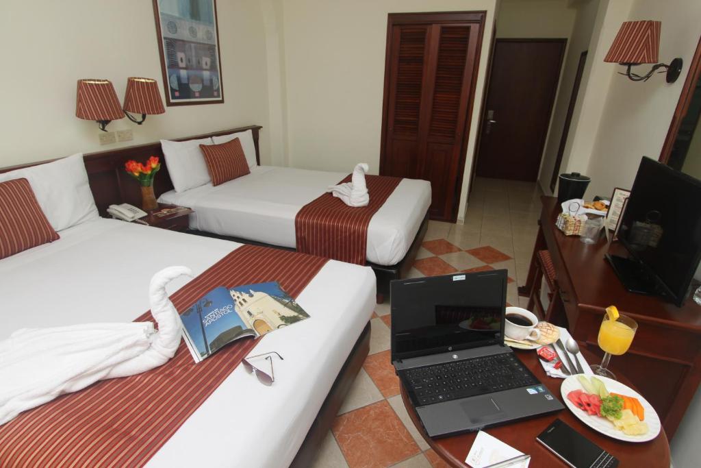 TV a/nebo společenská místnost v ubytování Hotel Residencial