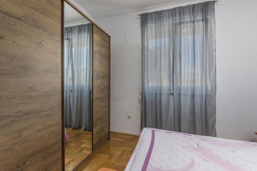 Postel nebo postele na pokoji v ubytování Apartment Nena