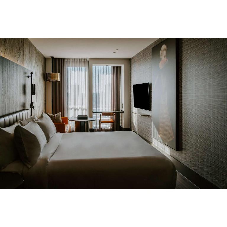 Postel nebo postele na pokoji v ubytování The Motley Hotel Richmond, Tapestry Collection by Hilton