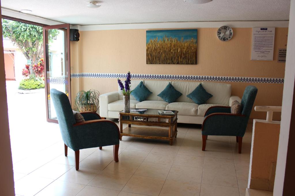Posezení v ubytování Hotel Express Alejandría