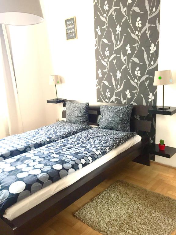 Posteľ alebo postele v izbe v ubytovaní Gozsdu Apartment