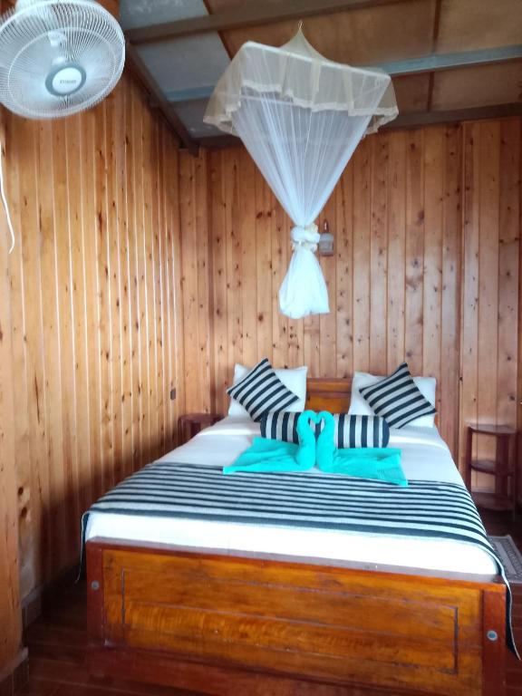 Postel nebo postele na pokoji v ubytování Sunray Homestay