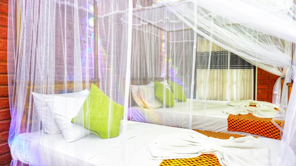 Postel nebo postele na pokoji v ubytování Osheen Homestay Sigiriya