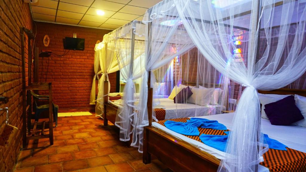 Postel nebo postele na pokoji v ubytování Osheen Homestay Sigiriya