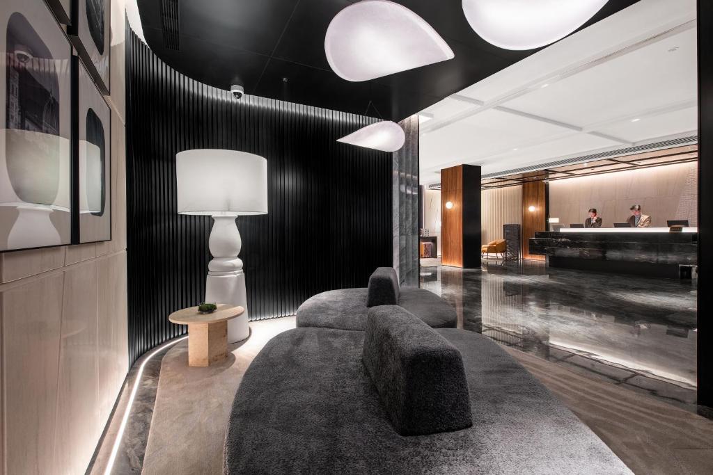 Posezení v ubytování IntercityHotel Shanghai South Xizang Road near Metro Station