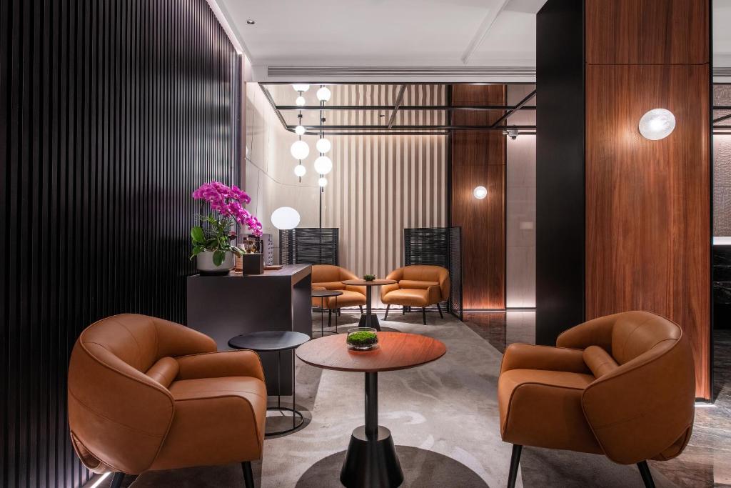 Posezení v ubytování IntercityHotel Shanghai South Xizang Road near Metro Station