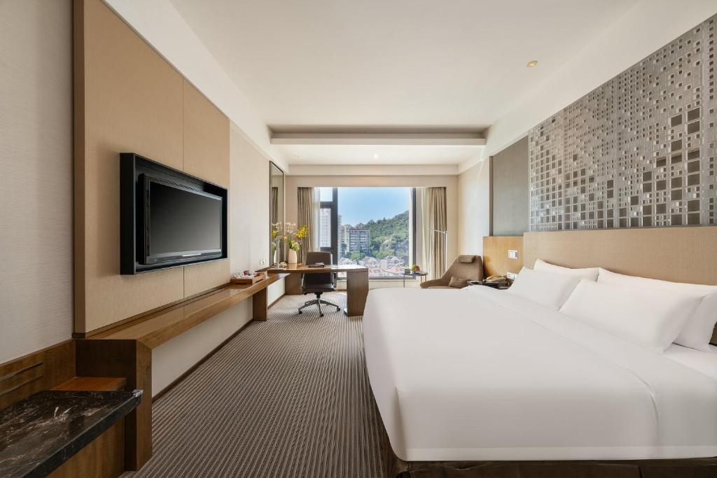 TV a/nebo společenská místnost v ubytování Juntai Hotel Xiamen
