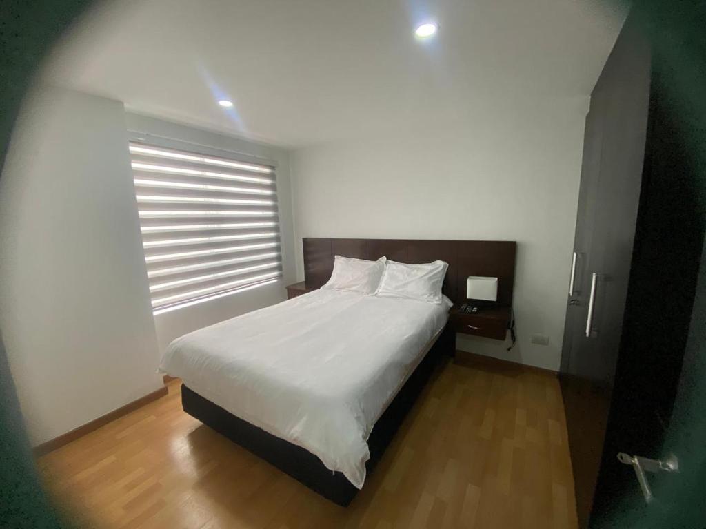 Katil atau katil-katil dalam bilik di Aparta-Hotel Alameda Plaza