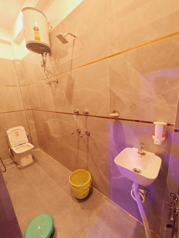 Vannituba majutusasutuses Krishna home stay