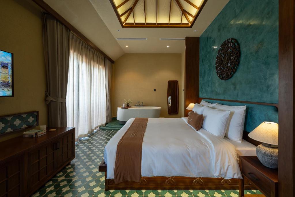 Giường trong phòng chung tại The Mist Boutique DaLat Hotel