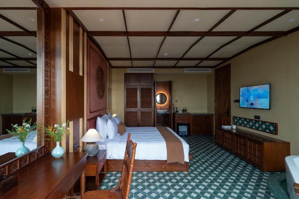 Giường trong phòng chung tại The Mist Boutique DaLat Hotel