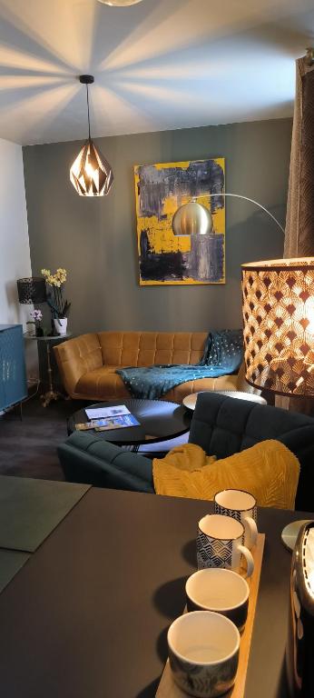 Posezení v ubytování Appartement sous les remparts