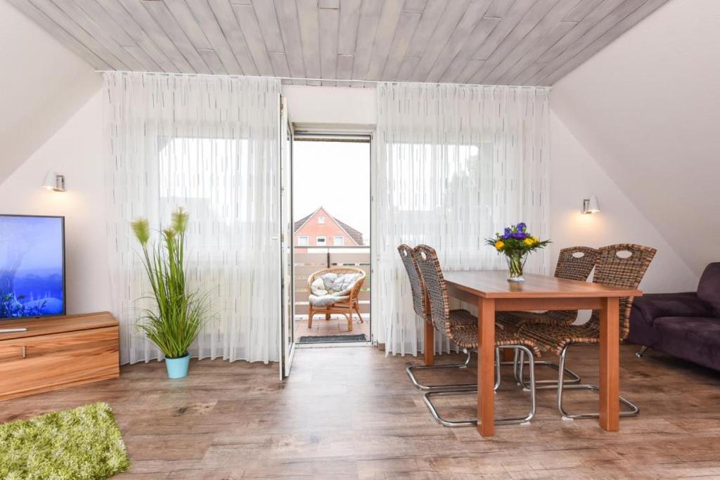 TV a/nebo společenská místnost v ubytování Haus zum Seehund FeWo Seehund 2