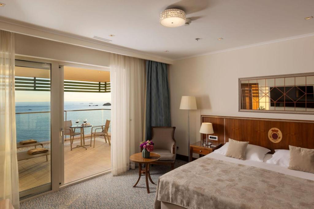 Postel nebo postele na pokoji v ubytování Hotel More