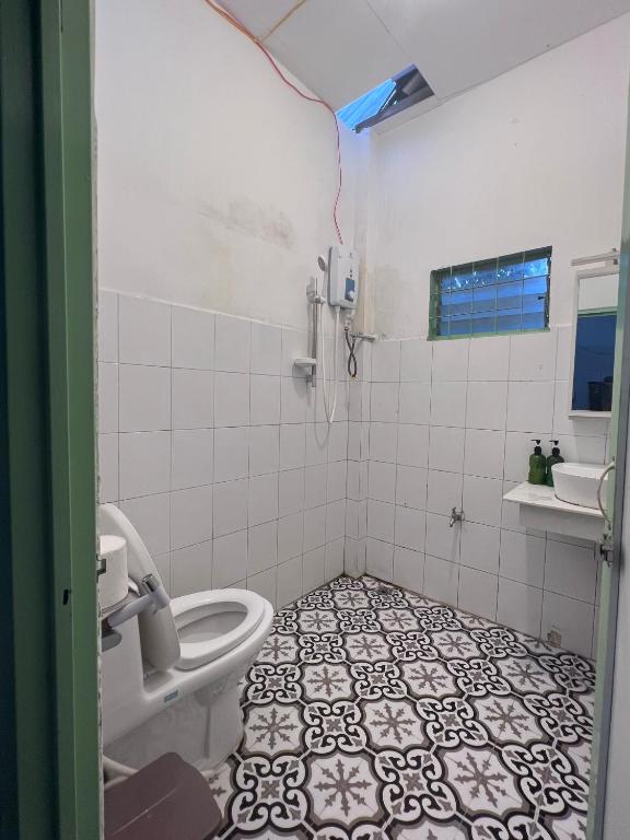 Koupelna v ubytování Anh Quân House