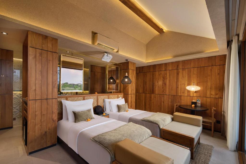 Postel nebo postele na pokoji v ubytování Sini Vie Luxury Resort & Spa Seminyak by Ini Vie Hospitality