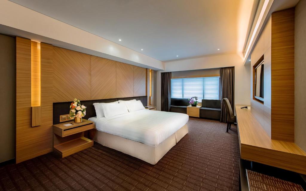 Postel nebo postele na pokoji v ubytování Rio Hotel