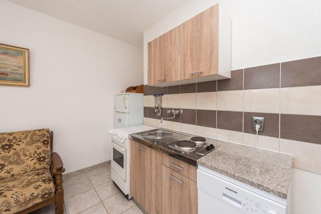 Kuchnia lub aneks kuchenny w obiekcie Apartments Jadra