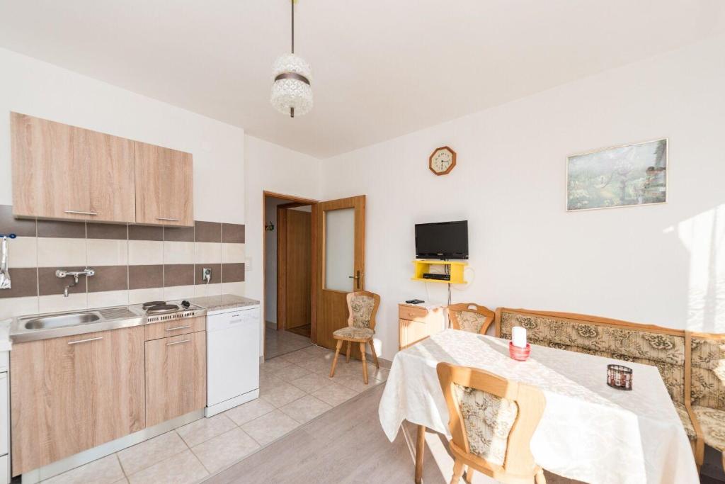 Kuchnia lub aneks kuchenny w obiekcie Apartments Jadra