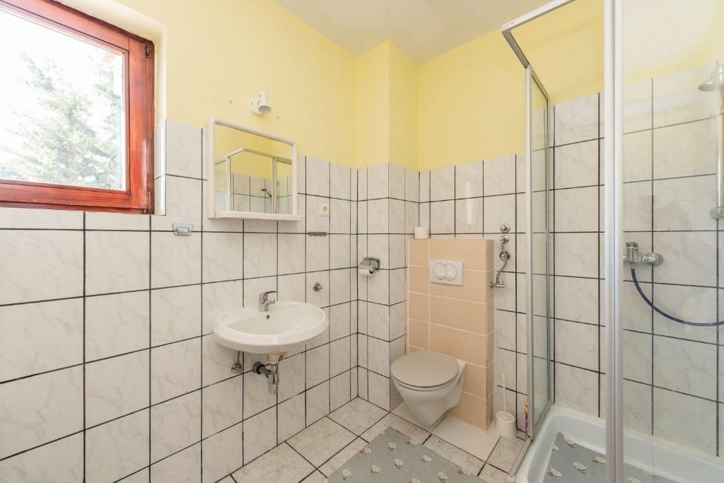 Łazienka w obiekcie Apartments Jadra