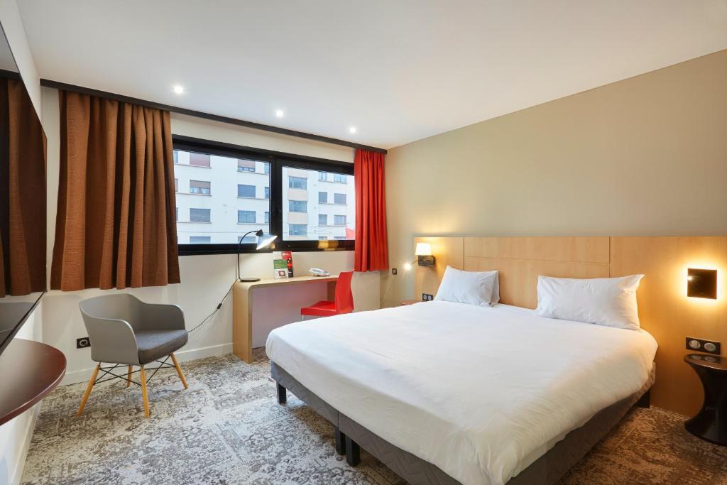 Postel nebo postele na pokoji v ubytování ibis Annemasse-Genève