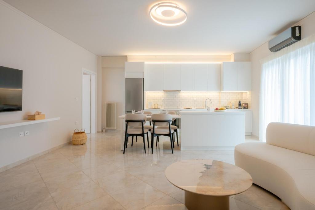 Kuchyň nebo kuchyňský kout v ubytování Apeiron Athena Residences