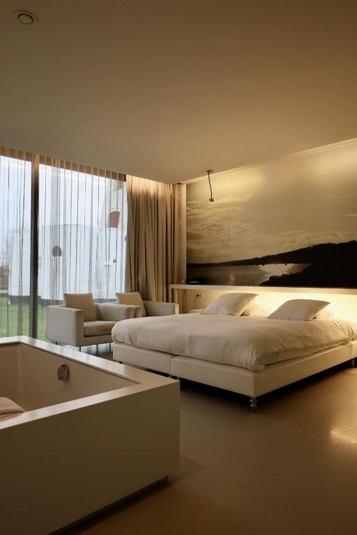Postel nebo postele na pokoji v ubytování D-Hotel