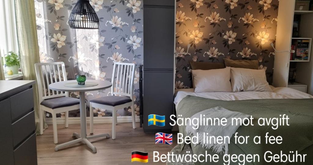 Postel nebo postele na pokoji v ubytování Mysig 1a med Minispa, 20 min från Kinnekulle