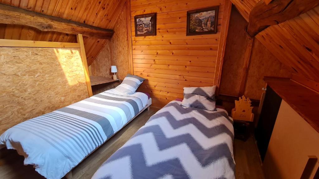 Postel nebo postele na pokoji v ubytování Chambres d'Hôtes Le Plessis à Broye