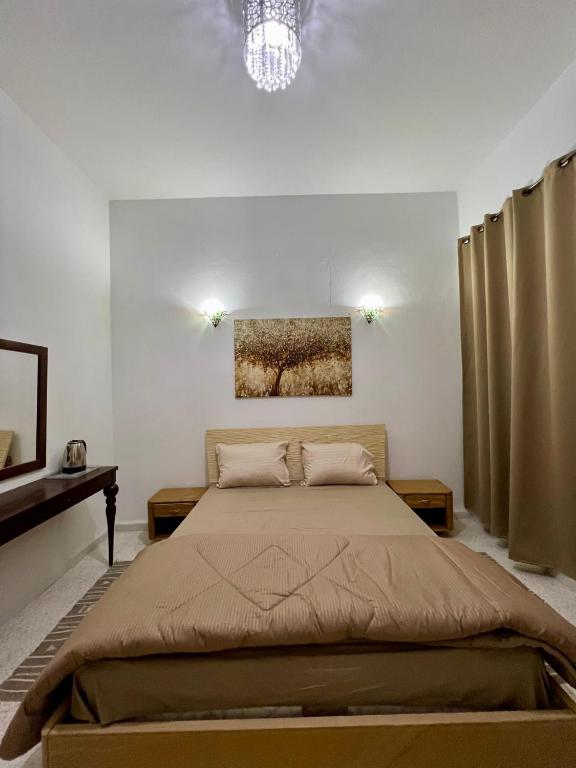 Postel nebo postele na pokoji v ubytování Dar Ali - Guesthouse