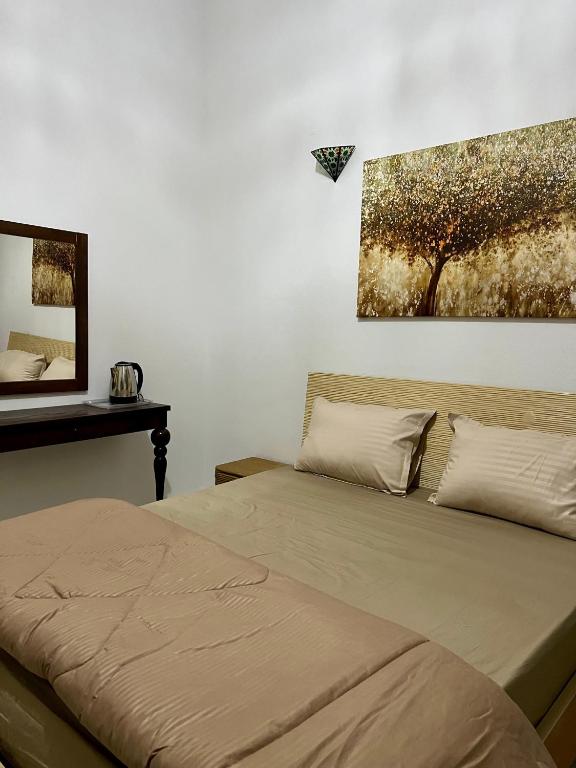 Postel nebo postele na pokoji v ubytování Dar Ali - Guesthouse