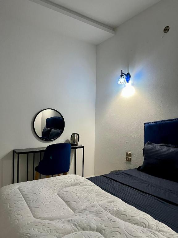 Postel nebo postele na pokoji v ubytování Dar Ali - Guesthouse