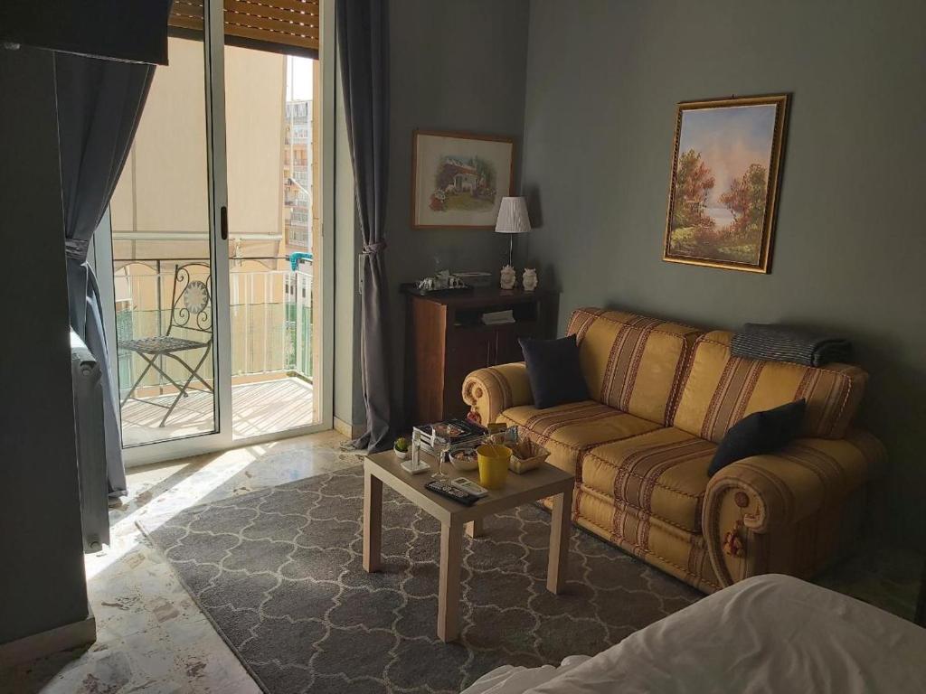 Posezení v ubytování L'ARENA ROOM