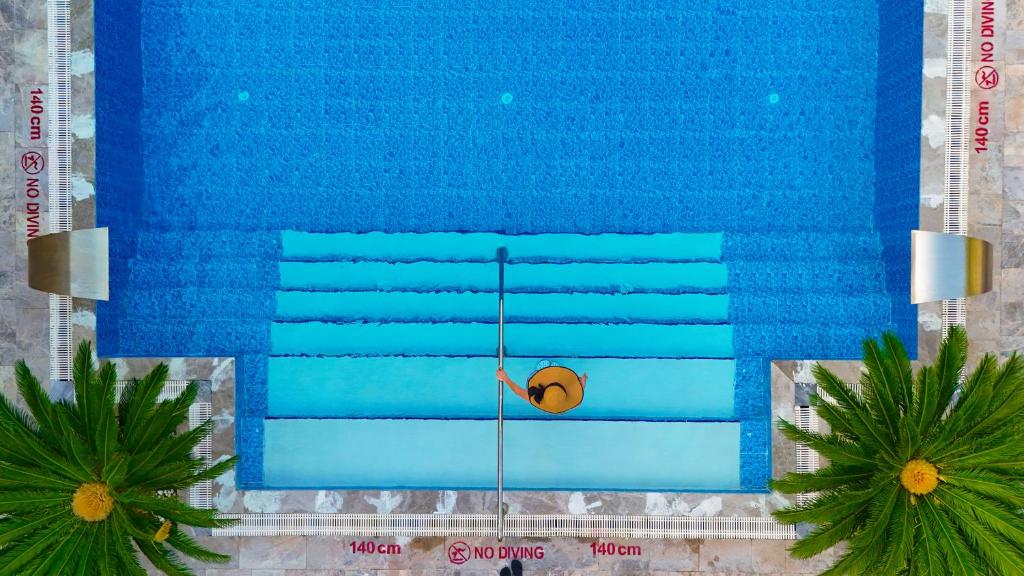 The swimming pool at or close to Ölüdeniz Turquoise Hotel - All Inclusive