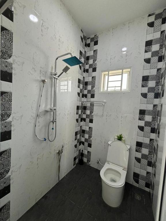 Koupelna v ubytování Homestay Bajet Cikgu Amin