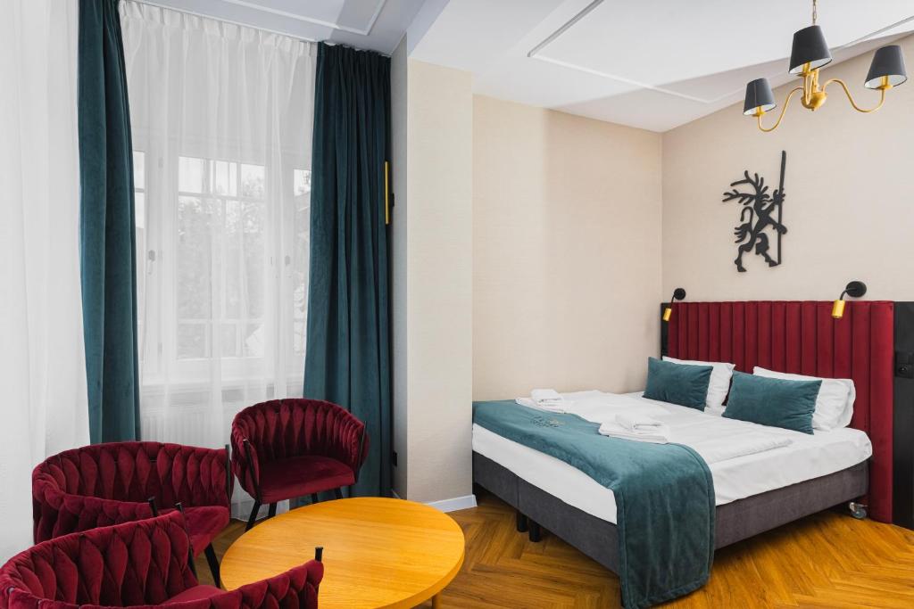 Postel nebo postele na pokoji v ubytování Perła Sudetów by Stay inn Hotels