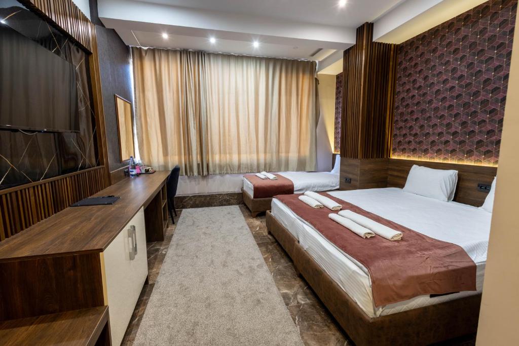 Postel nebo postele na pokoji v ubytování Aqua Spa Termale