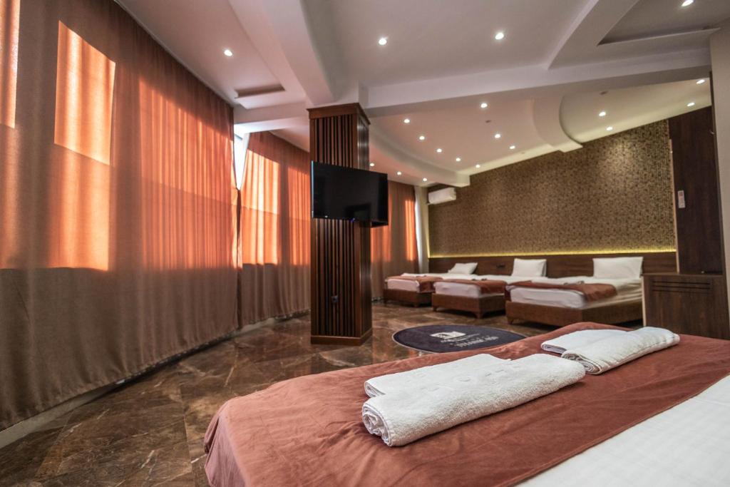 Postel nebo postele na pokoji v ubytování Aqua Spa Termale