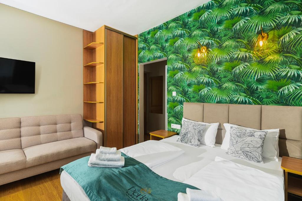 Postel nebo postele na pokoji v ubytování Perła Sudetów by Stay inn Hotels