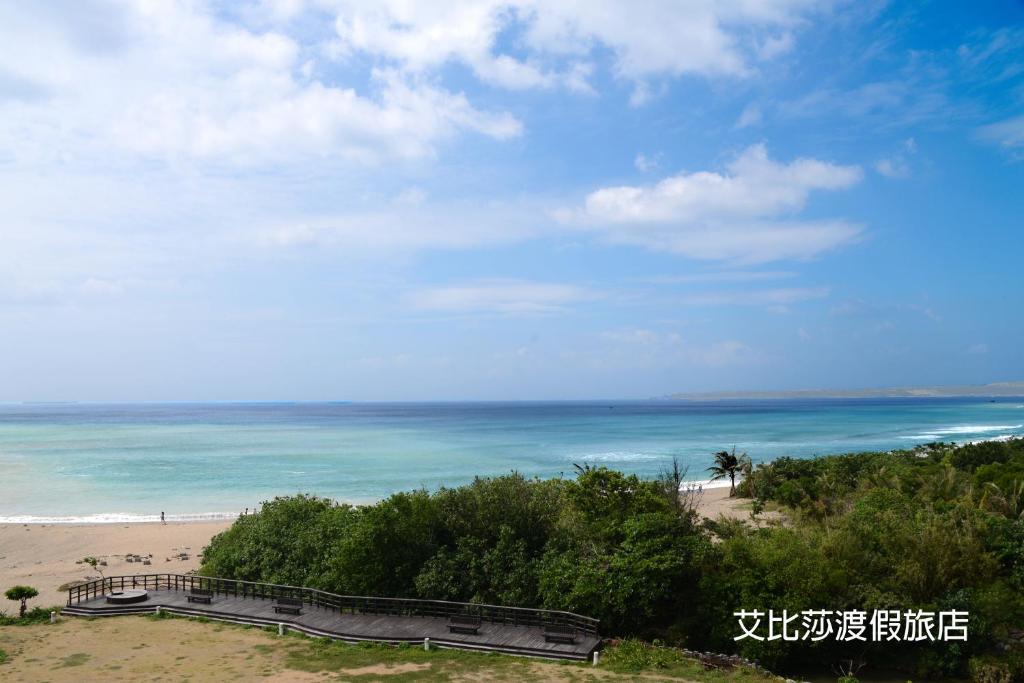 a view of the beach and the ocean at Ibizakenting Hotel in Kenting