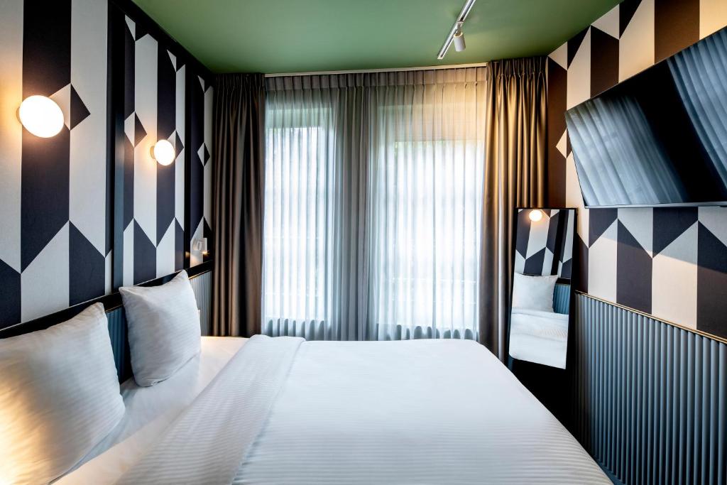 Tourist Inn Hotel Amsterdam - Resim 1