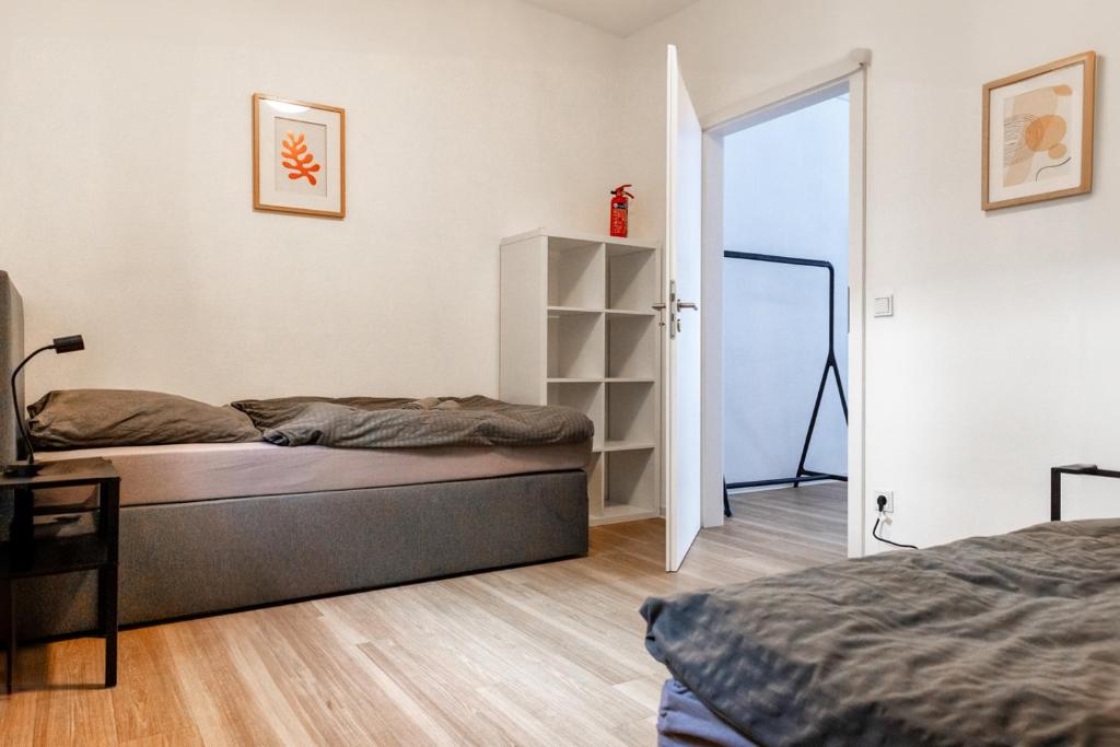 ゴッホにあるKleines zentrales Apartment in Goch - Netflixのベッドルーム1室(ベッド1台付)、