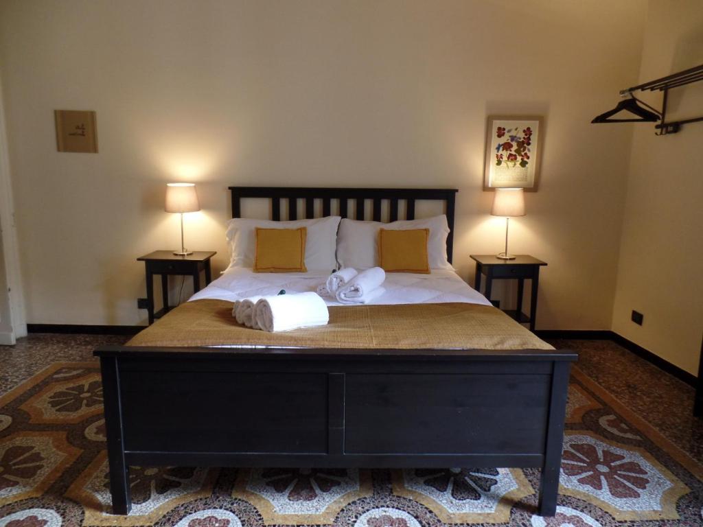 Posteľ alebo postele v izbe v ubytovaní B&B Genova Centro