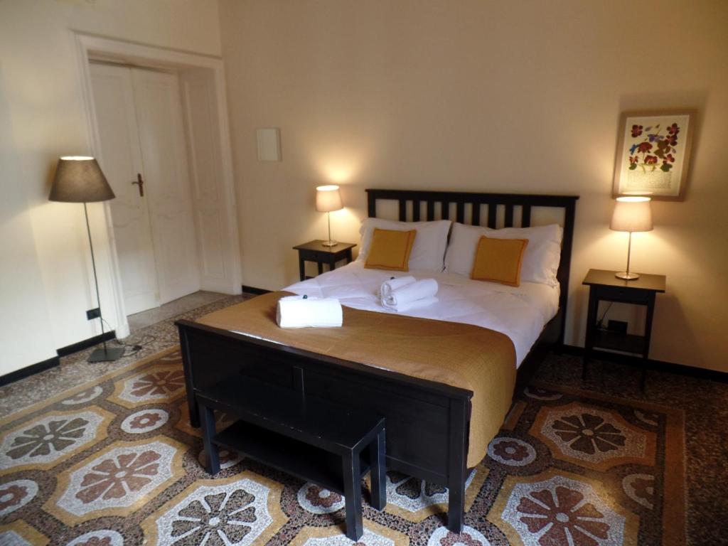Posteľ alebo postele v izbe v ubytovaní B&B Genova Centro