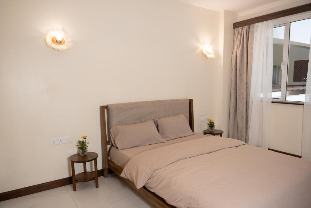 Postel nebo postele na pokoji v ubytování Silvermist Two & Three Bedrooms Wonderiss Homes Westland Living with close proximity to UN, Karura forest & Sarit Mall