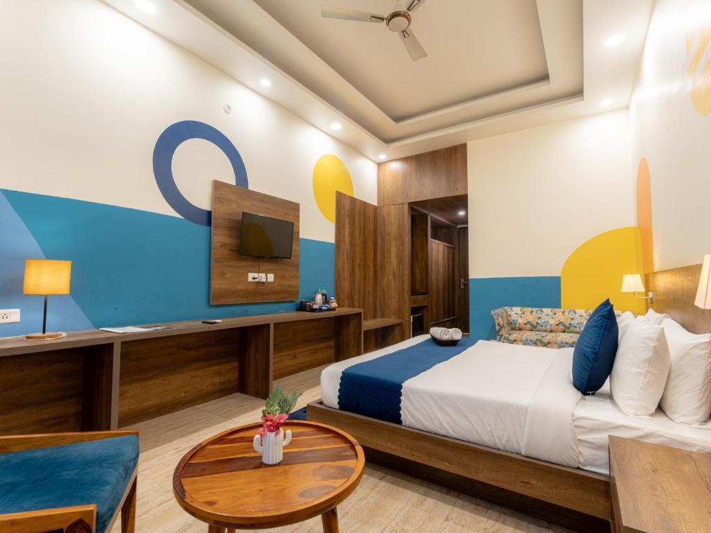Postel nebo postele na pokoji v ubytování Moustache Rishikesh Luxuria
