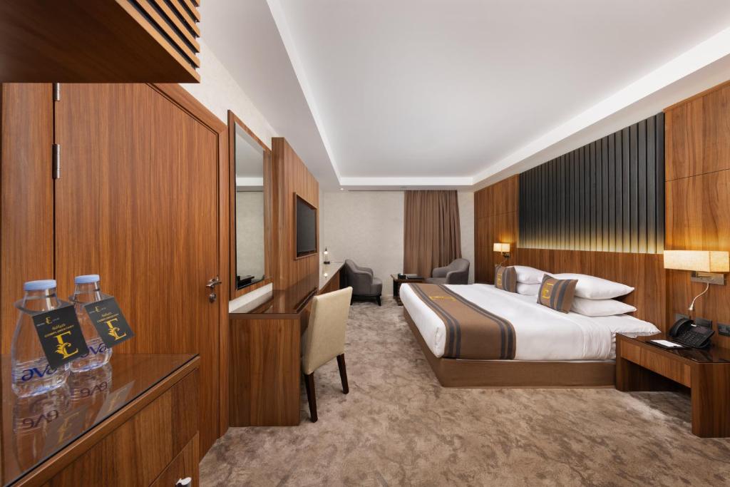 Voodi või voodid majutusasutuse E Hotel toas