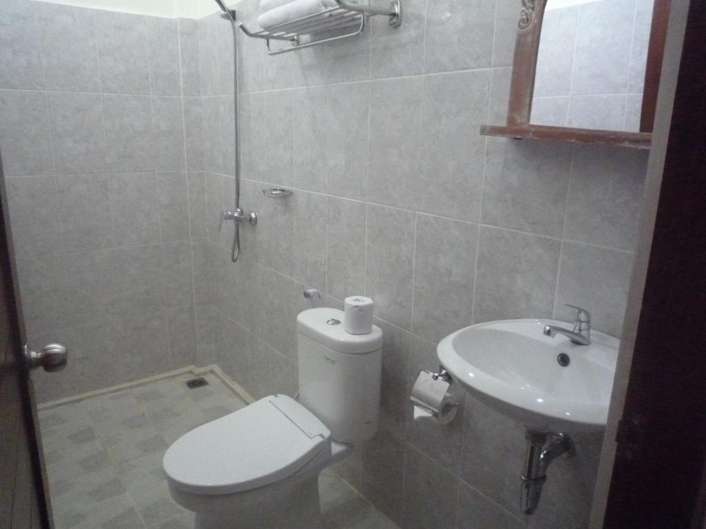 Koupelna v ubytování Pratama house